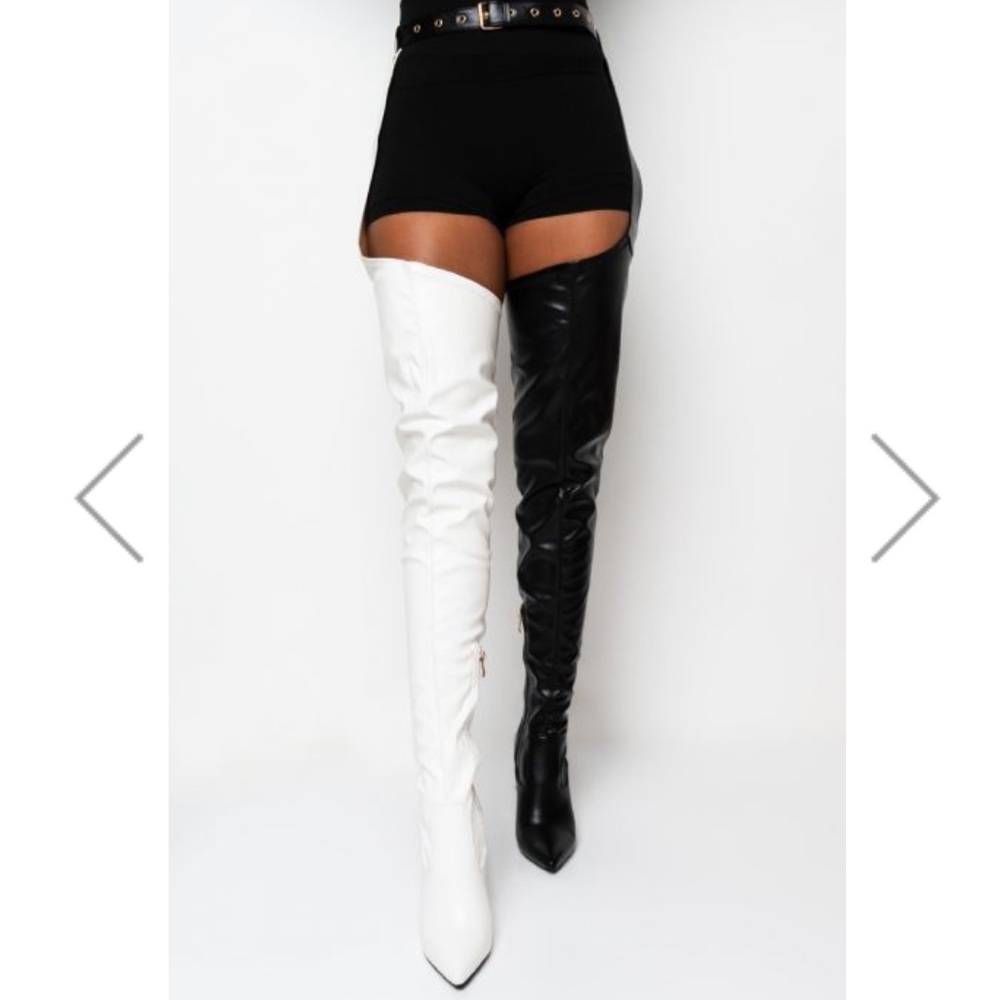 Stirrup belted boots in black and white (size 9)
